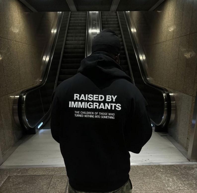 "Raised By Immigrants" Hoodie – Hispanic Heritage Pride
