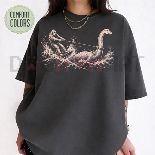 Garment-Dyed Cryptid Waterskiing Tee - Comfort Colors Vintage Bigfoot & Nessie Summer Shirt