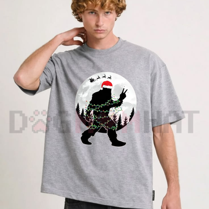 Funny Bigfoot Christmas Light Moon Forest Graphic T-Shirt