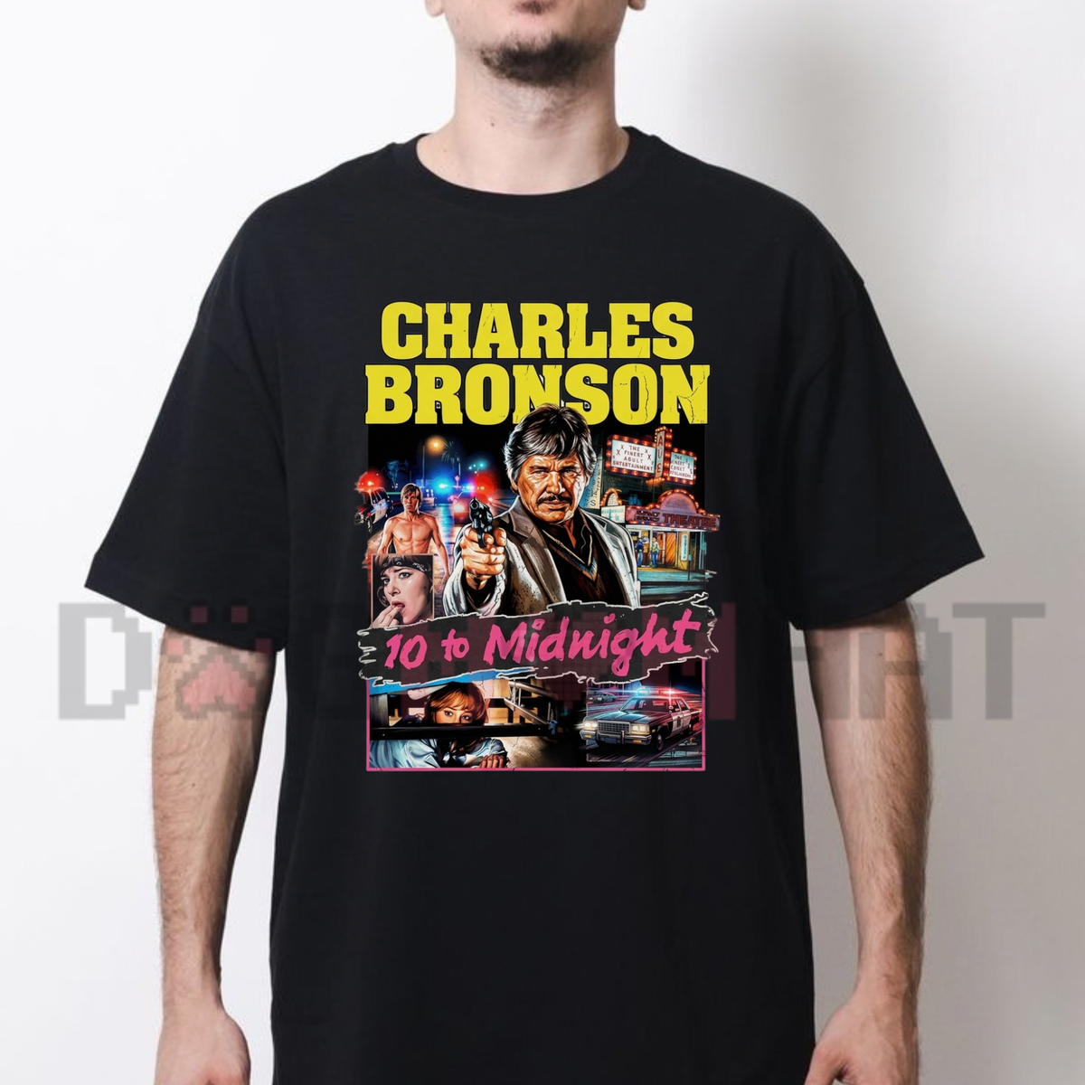 Front view of the 10 to Midnight 1983 Charles Bronson T-Shirt displaying vintage action poster graphic artwork printed across the chest of a casual cotton tee. - dogmomhat