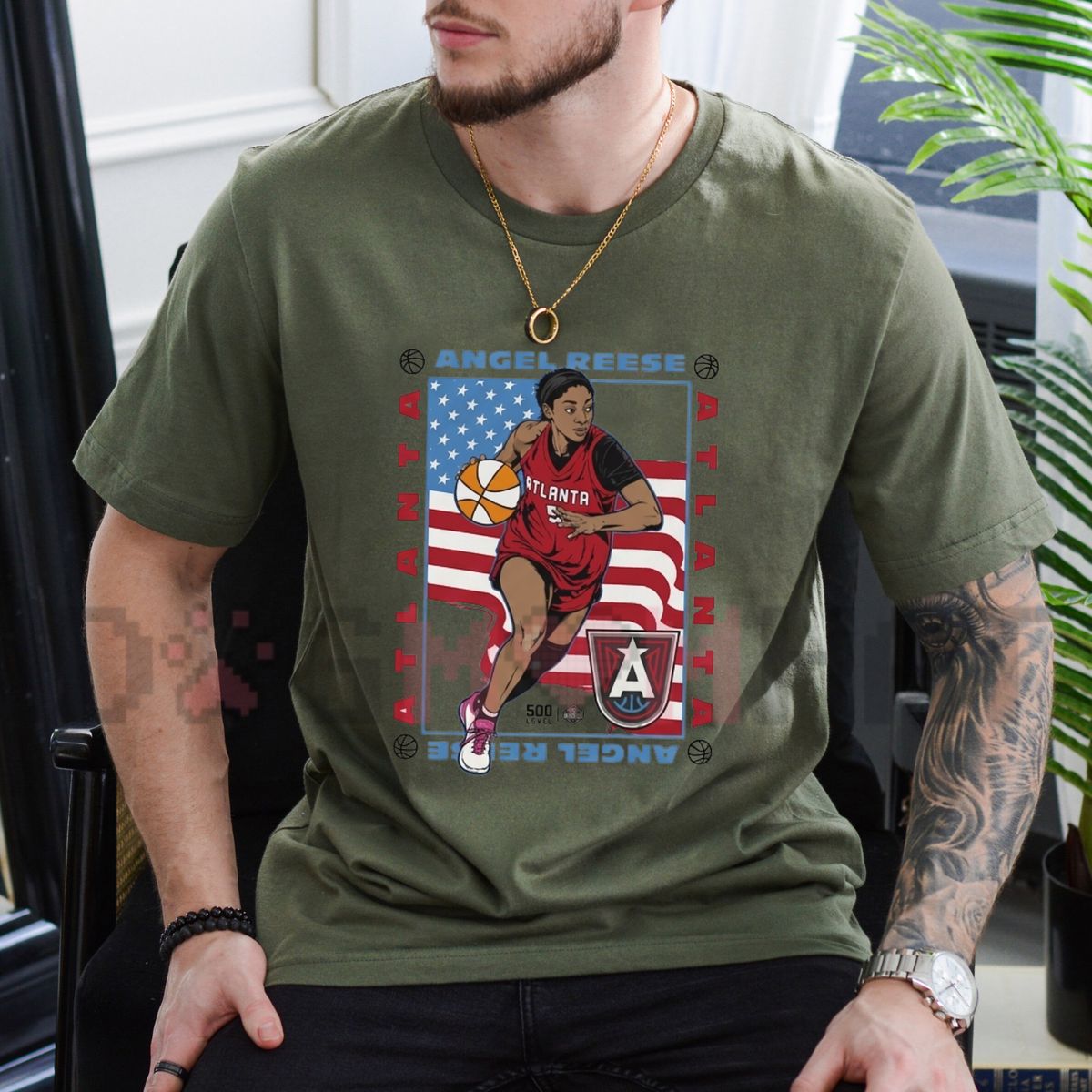 Front view of the Atlanta Hoops Star American Flag T-Shirt displaying basketball player silhouette and stars and stripes graphic artwork printed across the chest of a casual cotton tee. - dogmomnhat