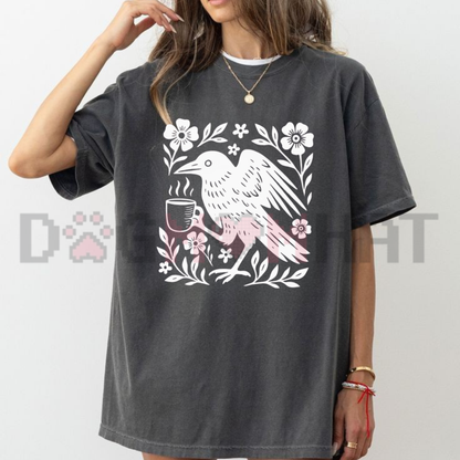 Front view of the Boho Crow Coffee T-Shirt displaying celestial crow holding a coffee cup graphic printed across the chest. - dogmomhat