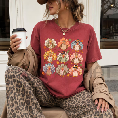 Front view of the Boho Turkey Thanksgiving T-Shirt displaying floral wild turkey and Give Thanks typography printed across the chest. - DOGMOMHAT