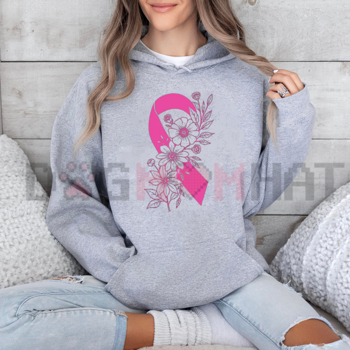 Front view of the Breast Cancer Floral Ribbon Hoodie displaying pink wildflower ribbon artwork printed across the chest of a cozy pullover. - dogmomhat