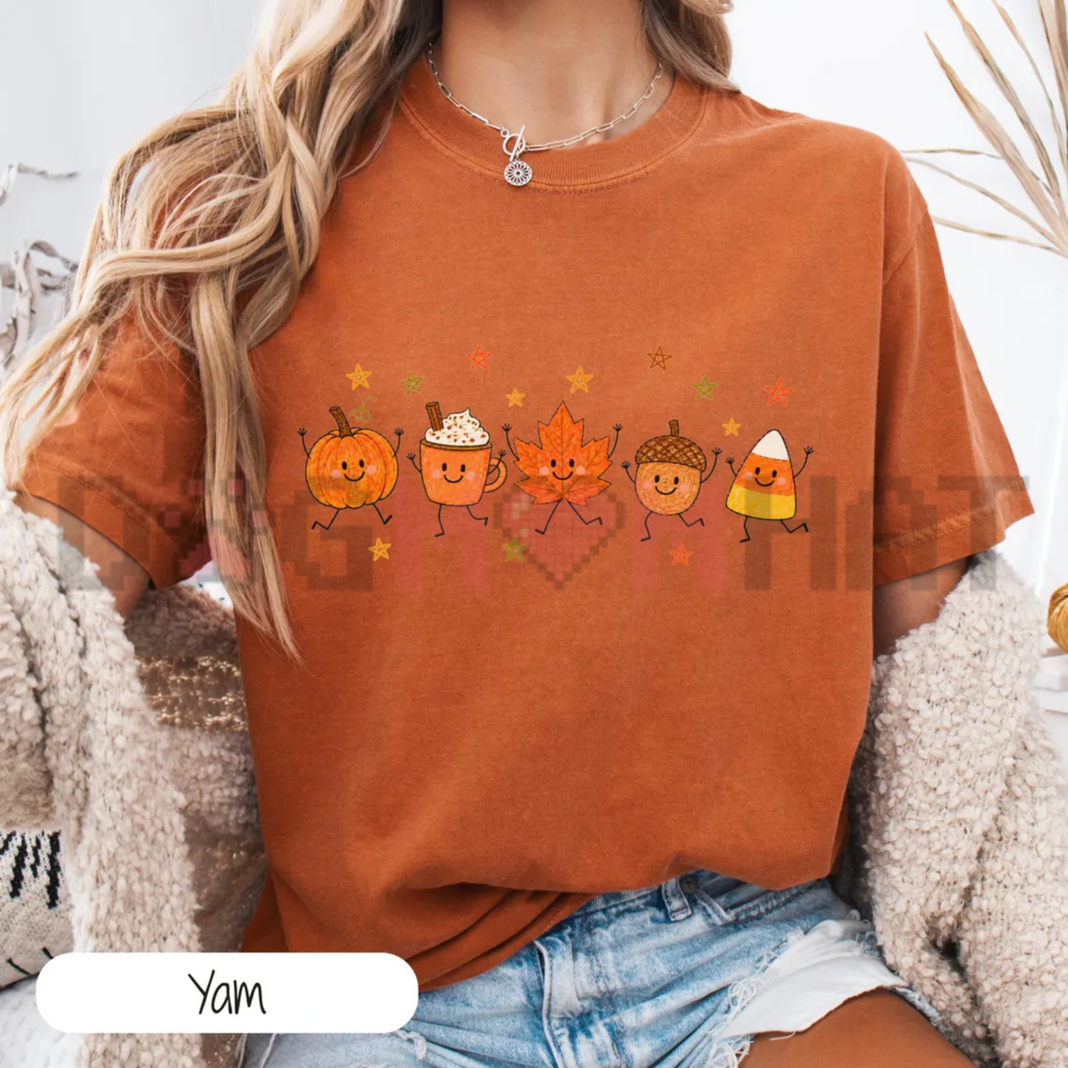 Front view of the Comfort Colors Cute Fall Doodle T-Shirt displaying cute autumn pumpkin and ghost doodle artwork printed across the chest of a garment-dyed cotton tee. - dogmomhat