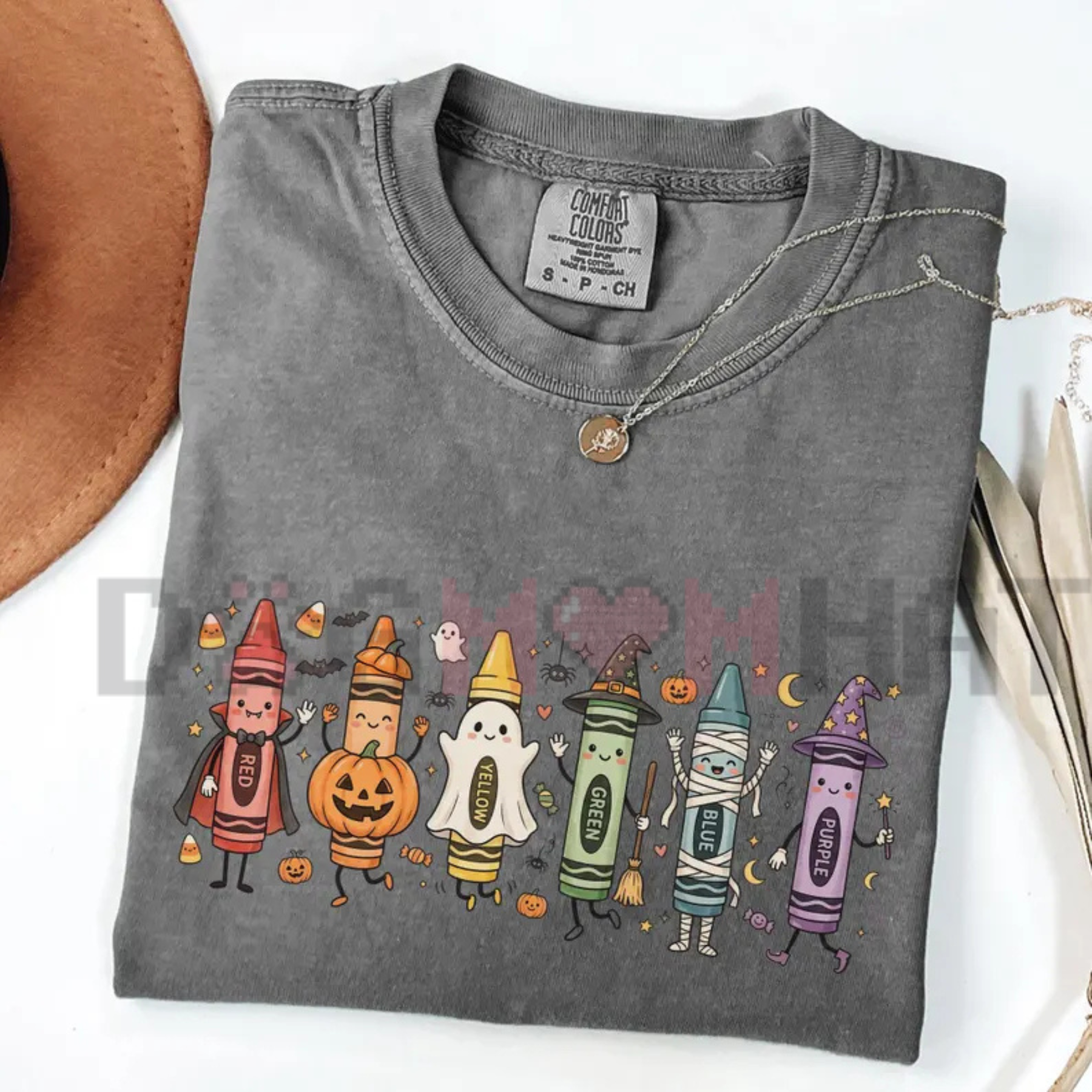 Front view of the Comfort Colors® Funny Teacher Life T-Shirt displaying colorful crayon and pencil doodle artwork printed across the chest. - dogmomhat