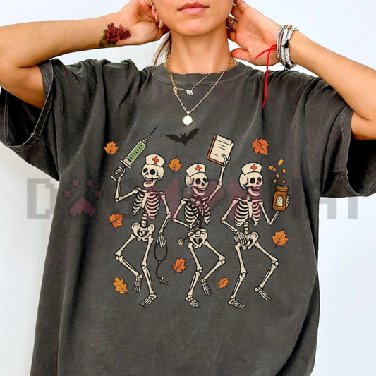 Front view of the Comfort Colors Halloween Nurse Skeleton T-Shirt showing the spooky RN graphic printed across the chest - dogmomhat