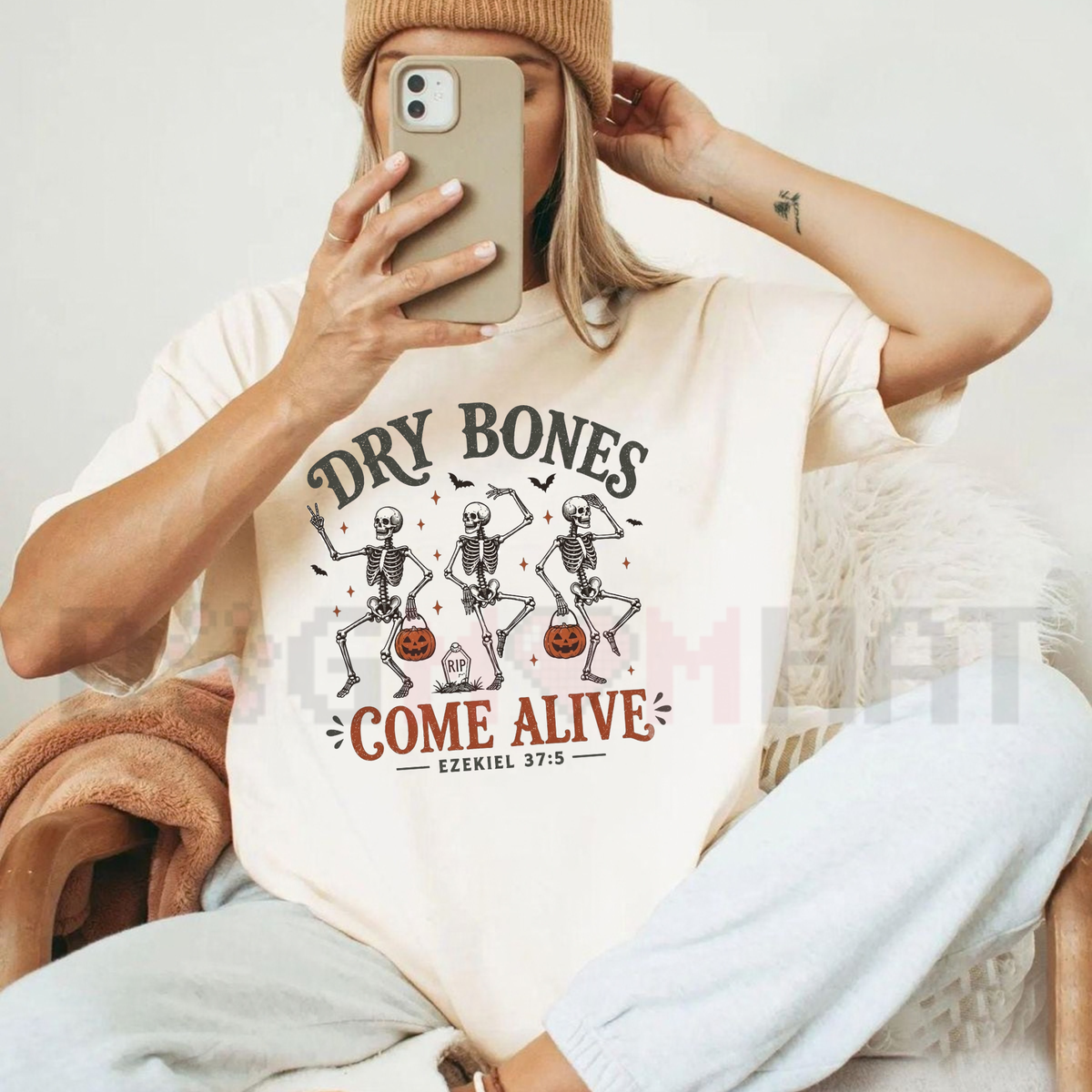 Front view of the Dry Bones Come Alive T-Shirt displaying dancing skeleton graphic art and Ezekiel scripture typography printed across the chest. - dogmomhat