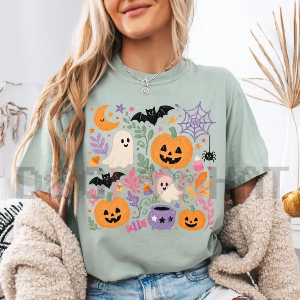 Front view of the Floral Ghost Pumpkin T-Shirt displaying preppy floral ghost and pumpkin graphics printed across the chest. - dogmomhat
