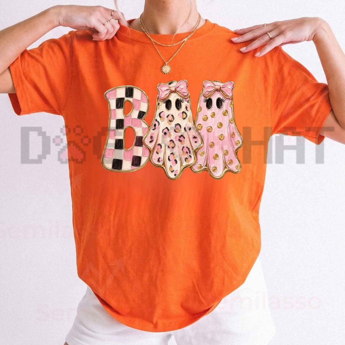 Front view of the Girly Ghost Boo T-Shirt displaying glam ghost artwork with coquette pink bows printed across the chest of a casual cotton tee. - dogmomhat
