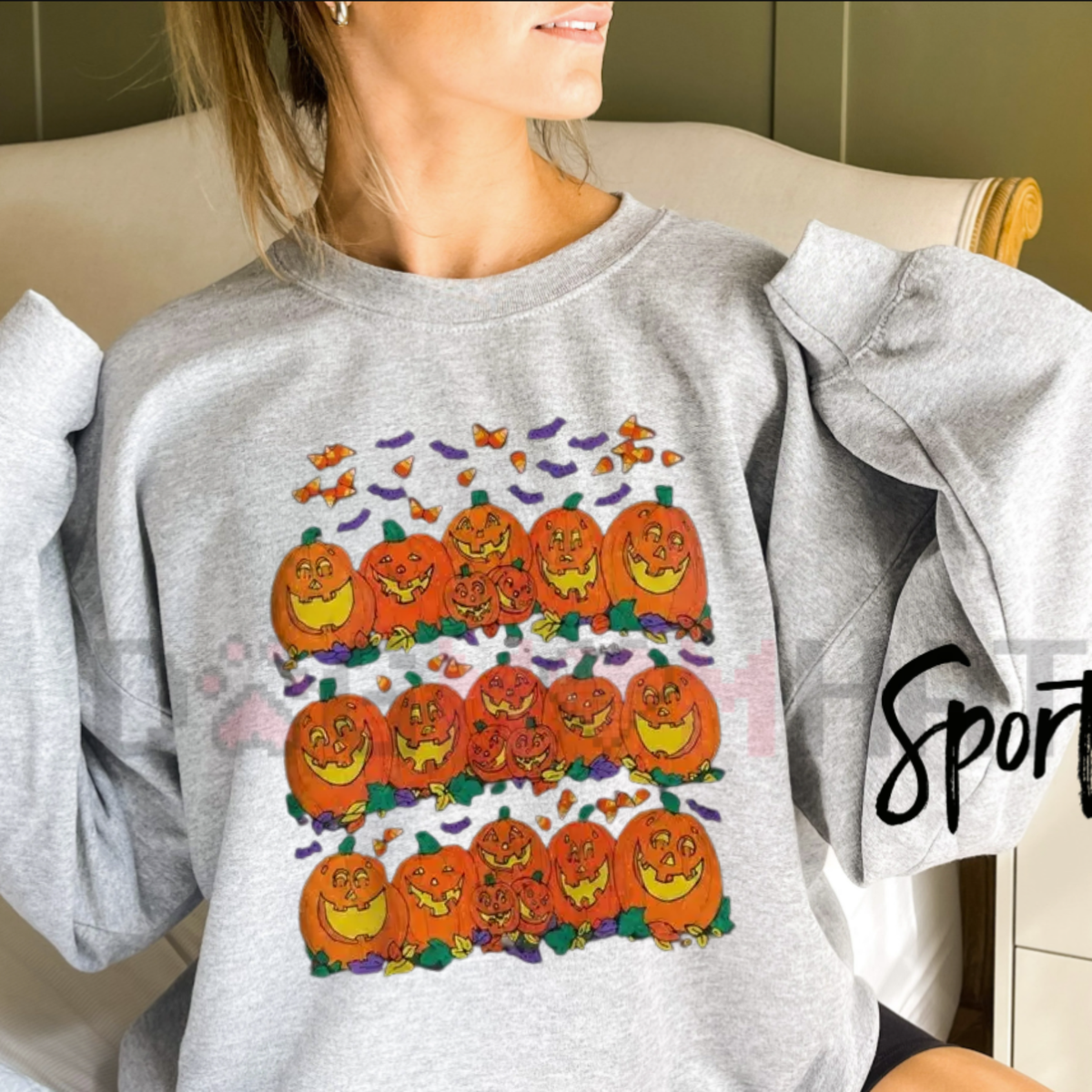 Front view of the Halloween Pumpkin Graphic Sweatshirt displaying cute spooky fall pumpkin artwork printed across the chest. - dogmomhat