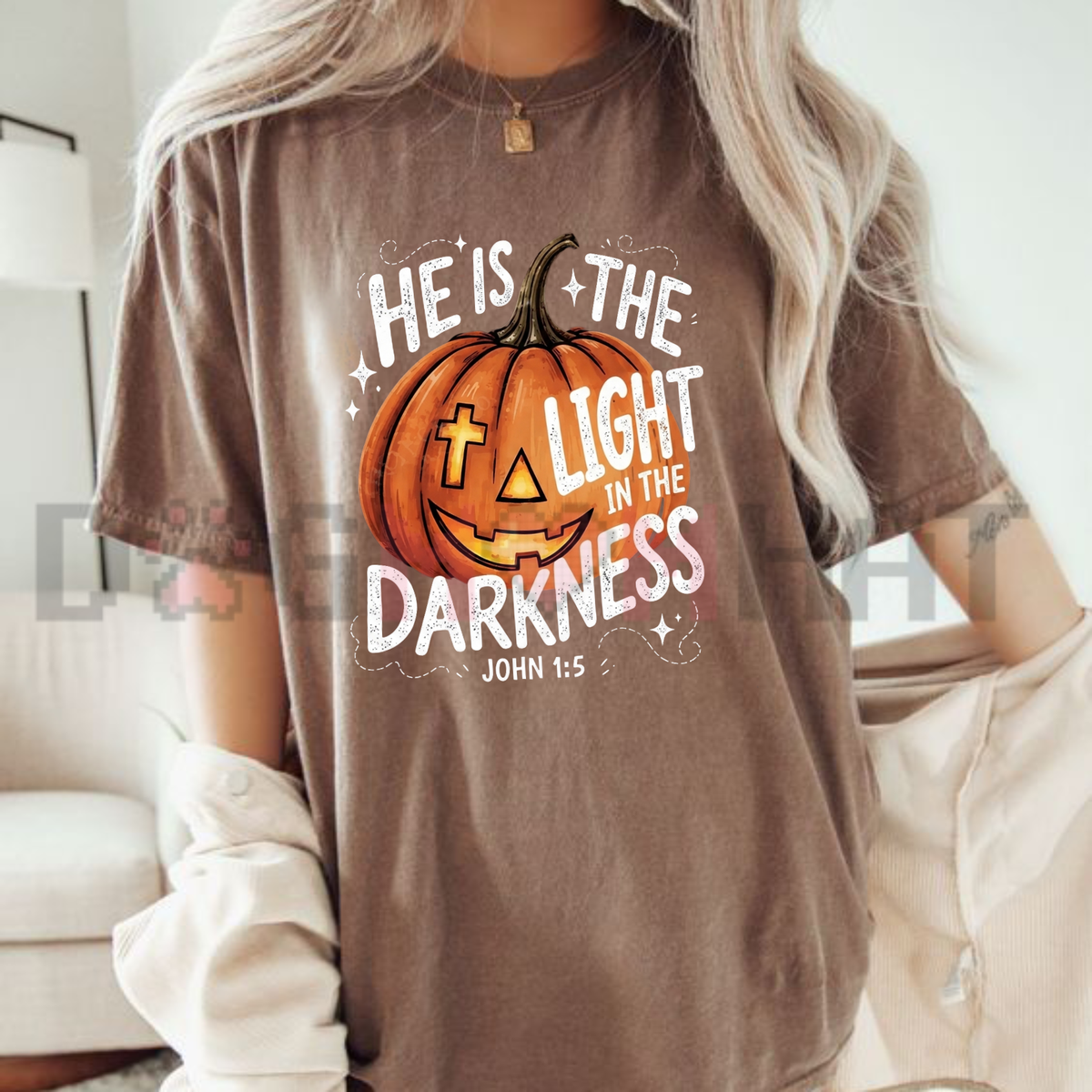 Front view of the He Is The Light Fall Religious T-Shirt displaying retro sunburst and autumn floral typography printed across the chest. - dogmomhat