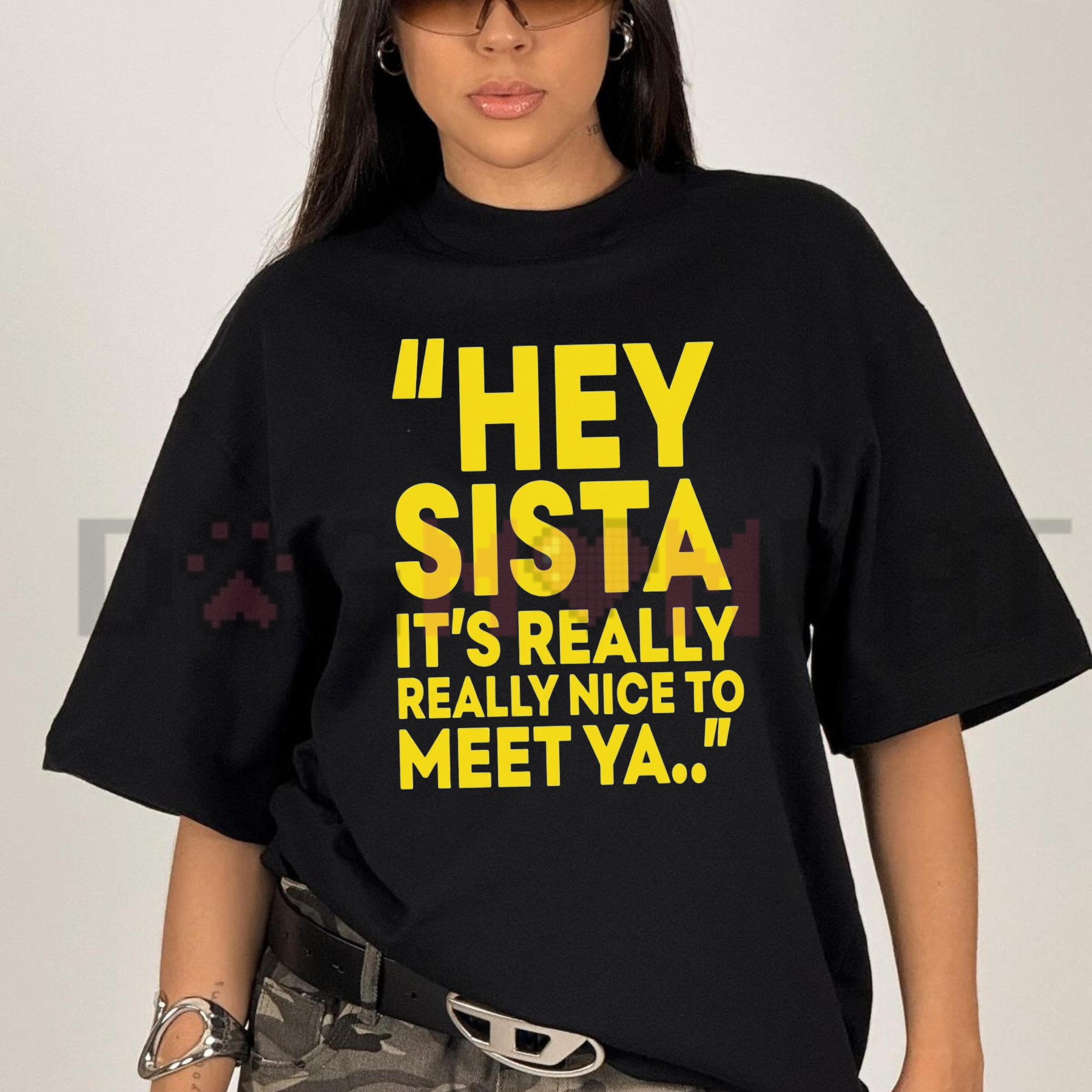 Front view of the "Hey Sista It's Really Really Nice To Meet Ya" T-Shirt showing the bold retro quote graphic printed across the chest.