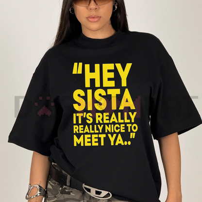 Front view of the "Hey Sista It's Really Really Nice To Meet Ya" T-Shirt showing the bold retro quote graphic printed across the chest.