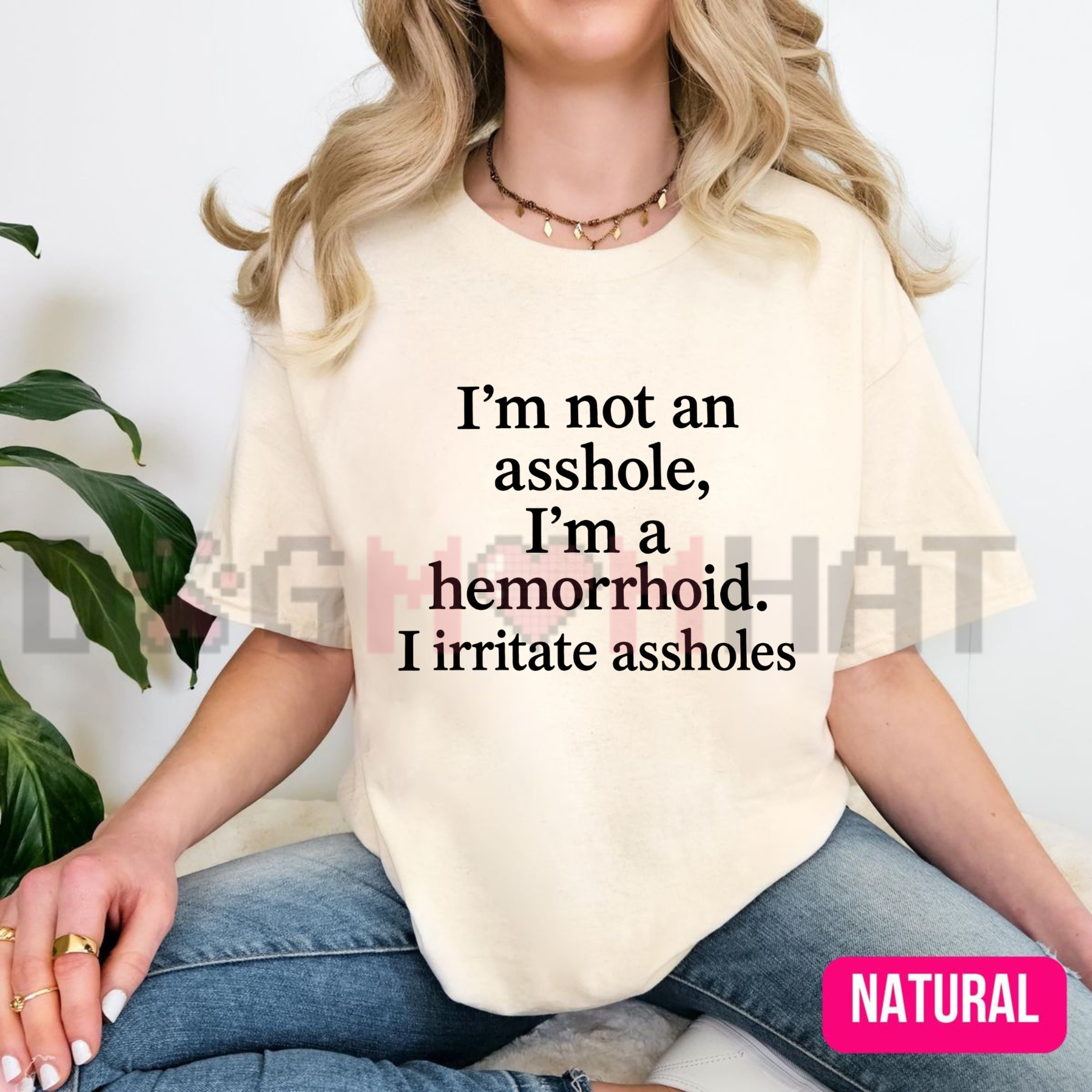Front view of the "I'm Not An Asshole I'm A Hemorrhoid" Graphic T-Shirt displaying funny sarcastic quote typography printed across the chest. - dogmomhat