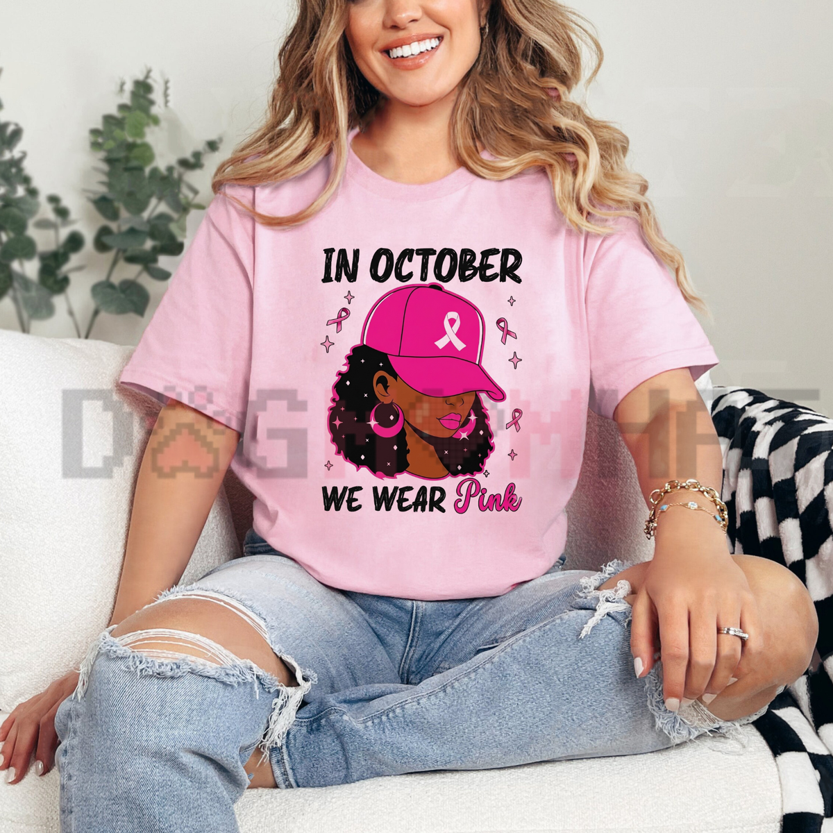 Front view of the In October We Wear Pink T-Shirt displaying pink heart and pumpkin graphic artwork printed across the chest. - dogmomhat