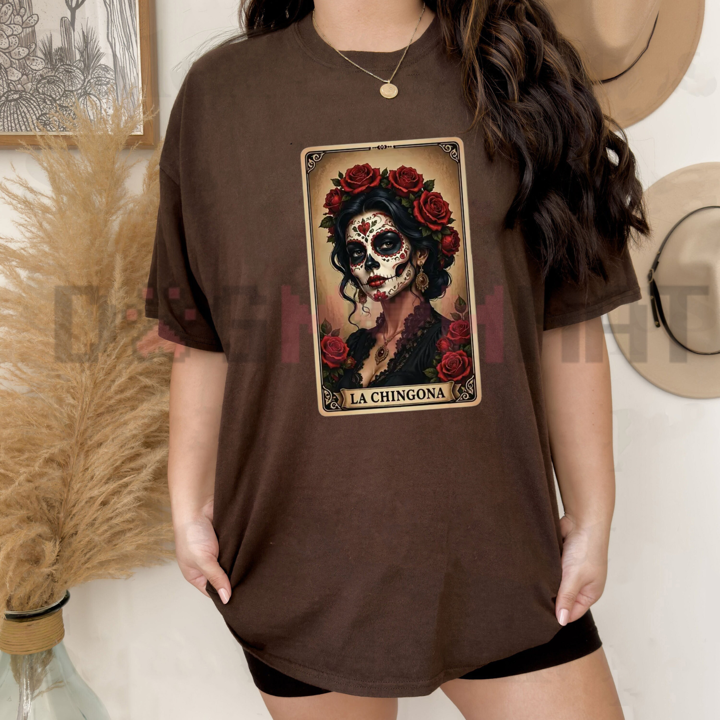 Front view of the La Chingona Tarot Card Sugar Skull T-Shirt displaying red rose and Day of the Dead graphic artwork printed across the chest. - dogmomhat