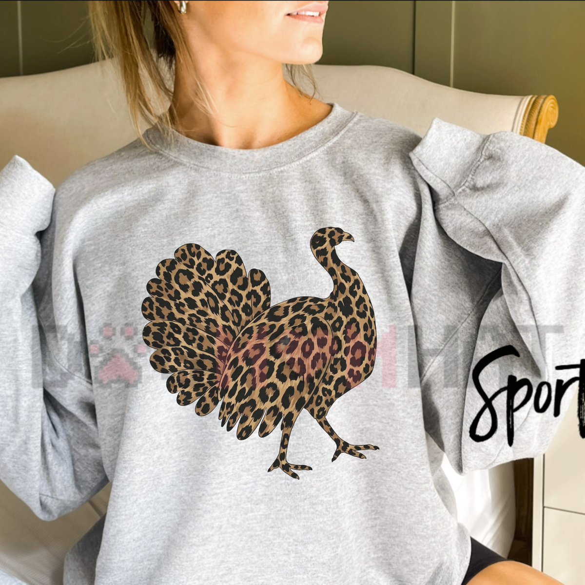 Front view of the Leopard Print Turkey Thanksgiving Sweatshirt displaying animal print turkey artwork printed across the chest of a cozy fleece crewneck. - dogmomhat