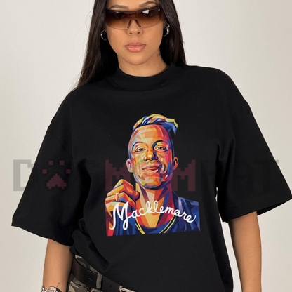 Front view of the Macklemore World Tour 2026 T-Shirt displaying hip-hop concert graphic artwork printed across the chest. - dogmomhat