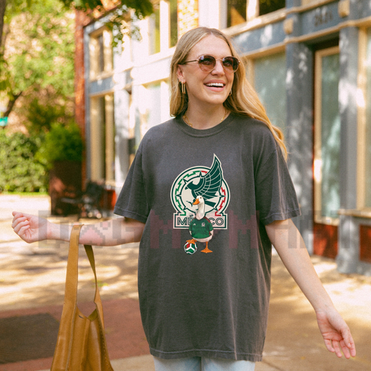 Front view of the Mexico 26 Funny Goose Cup Graphic Unisex T-Shirt in a casual setting - dogmomhat