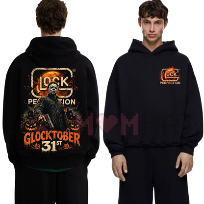 Front view of the Michael Myers Glocktober 31st Hoodie displaying glowing pumpkin graphics printed across the chest of a cozy fleece pullover. - dogmomhat