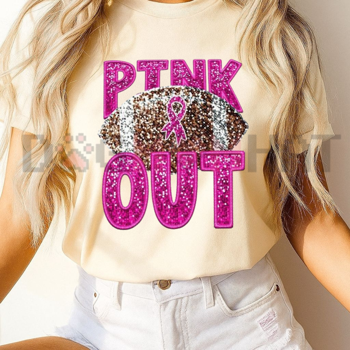 Front view of the Pink Glitter Football T-Shirt displaying pink ribbon and football laces graphic artwork printed across the chest. - dogmomhat