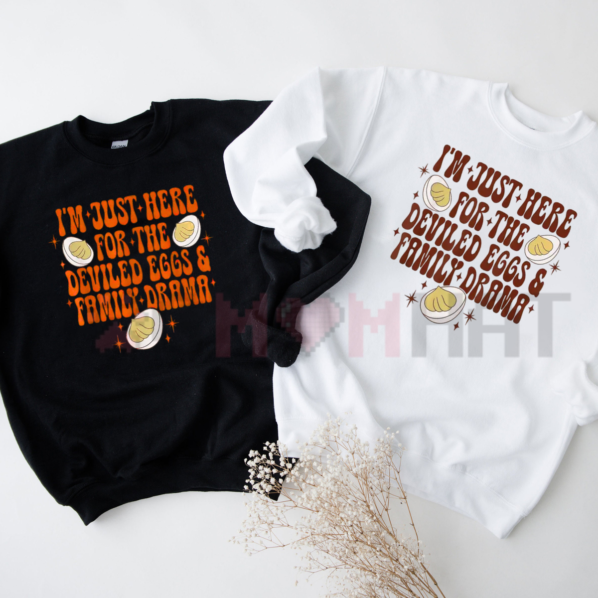 Front view of the Thanksgiving sweatshirt displaying retro 'I'm Just Here for the Deviled Eggs and Family Drama' graphic typography across the chest of a cozy crewneck pullover. - dogmomhat