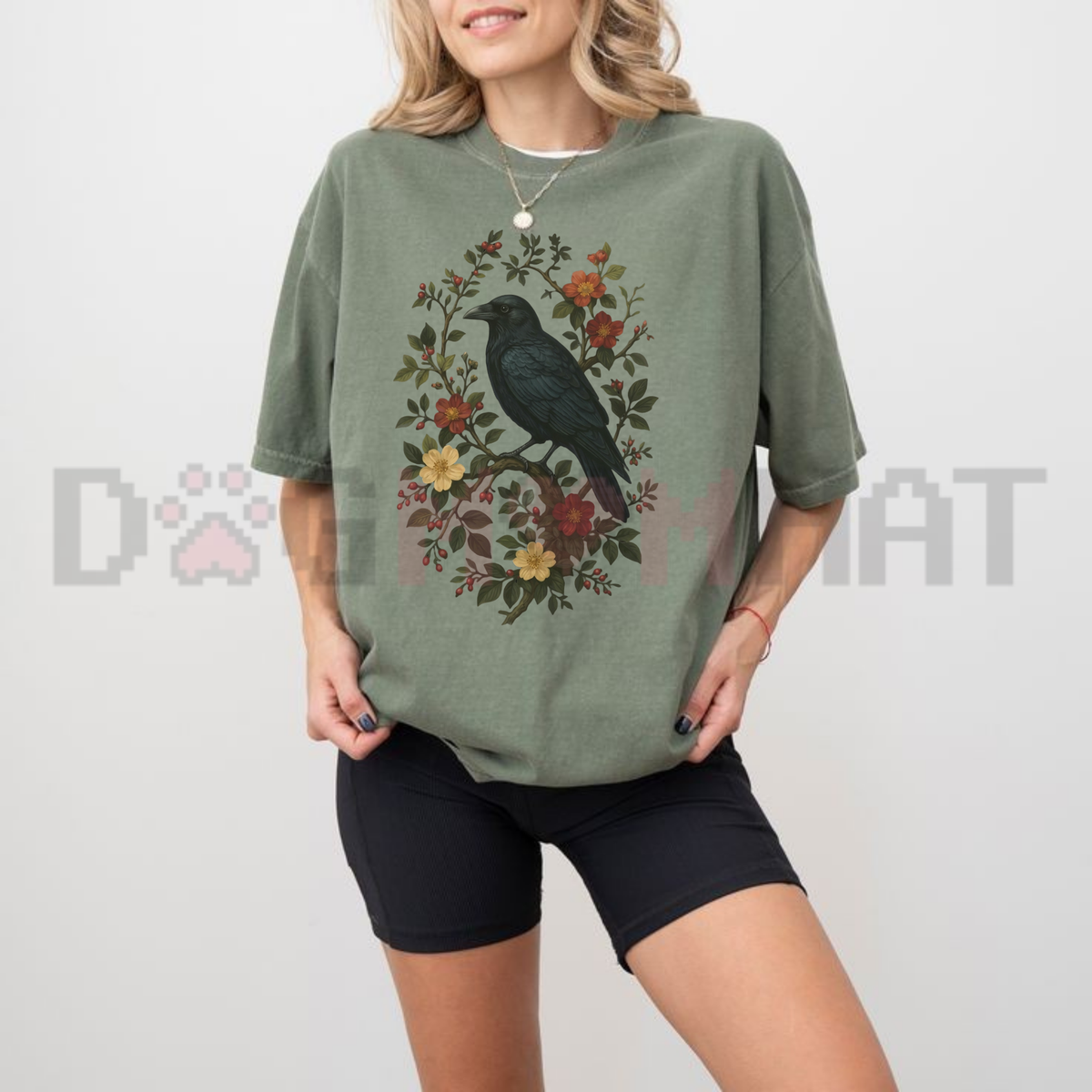 Front view of the Vintage Raven T-Shirt displaying gothic crow and botanical floral graphics printed across the chest. - dogmomhat
