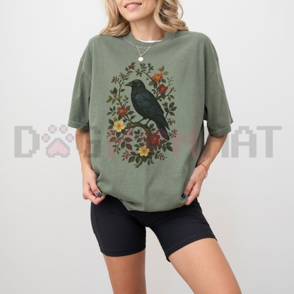 Front view of the Vintage Raven T-Shirt displaying gothic crow and botanical floral graphics printed across the chest. - dogmomhat