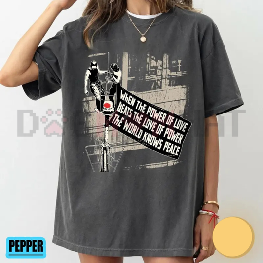 Front view of the When The Power Of Love Beats The Love Of Power Graphic T-Shirt - dogmomhat