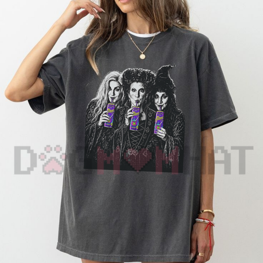 Front view of the Witches Brew T-Shirt displaying energy drink can graphics and Sanderson Sisters potion text printed across the chest. - dogmomhat