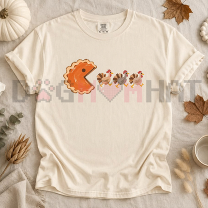 Front view of the arcade feast tee displaying funny Pumpkin Pacman arcade graphic artwork across the chest of a Comfort Colors shirt. - dogmomhat