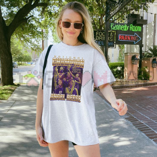 Front view of the bayou ring tee displaying Angel Reese national champion graphic artwork across the chest of a garment-dyed shirt. - dogmomhat
