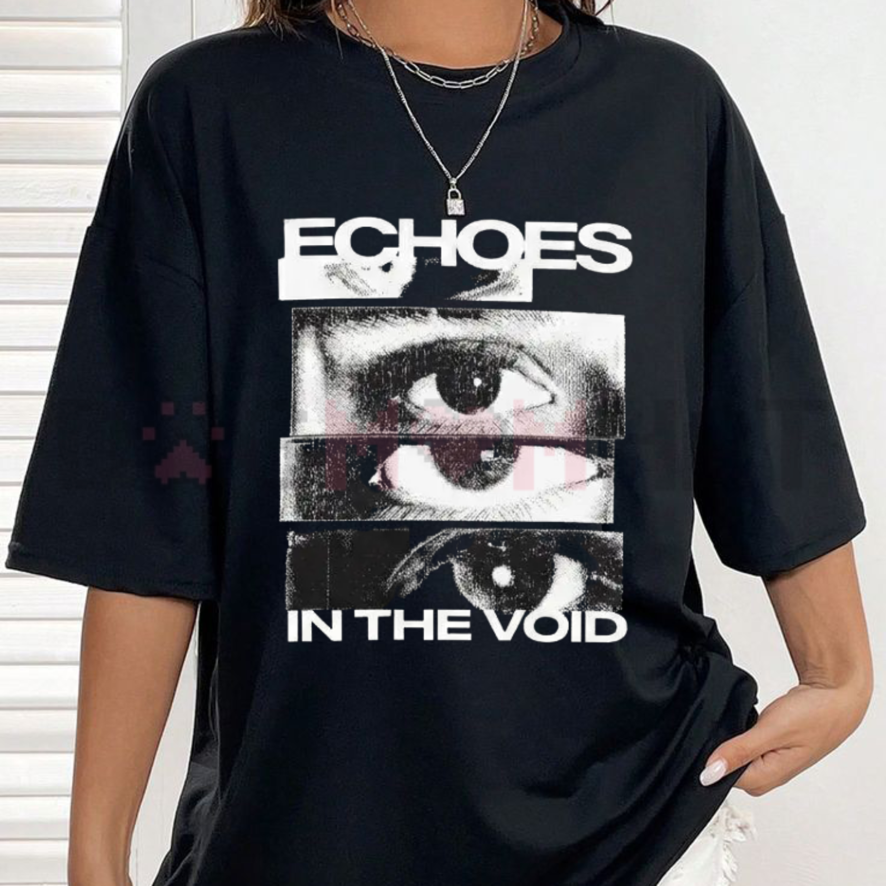 Front view of the black Glitch Eye Oversized Streetwear T-Shirt showing the detailed retro cyber digital eye print across the chest - dogmomhat