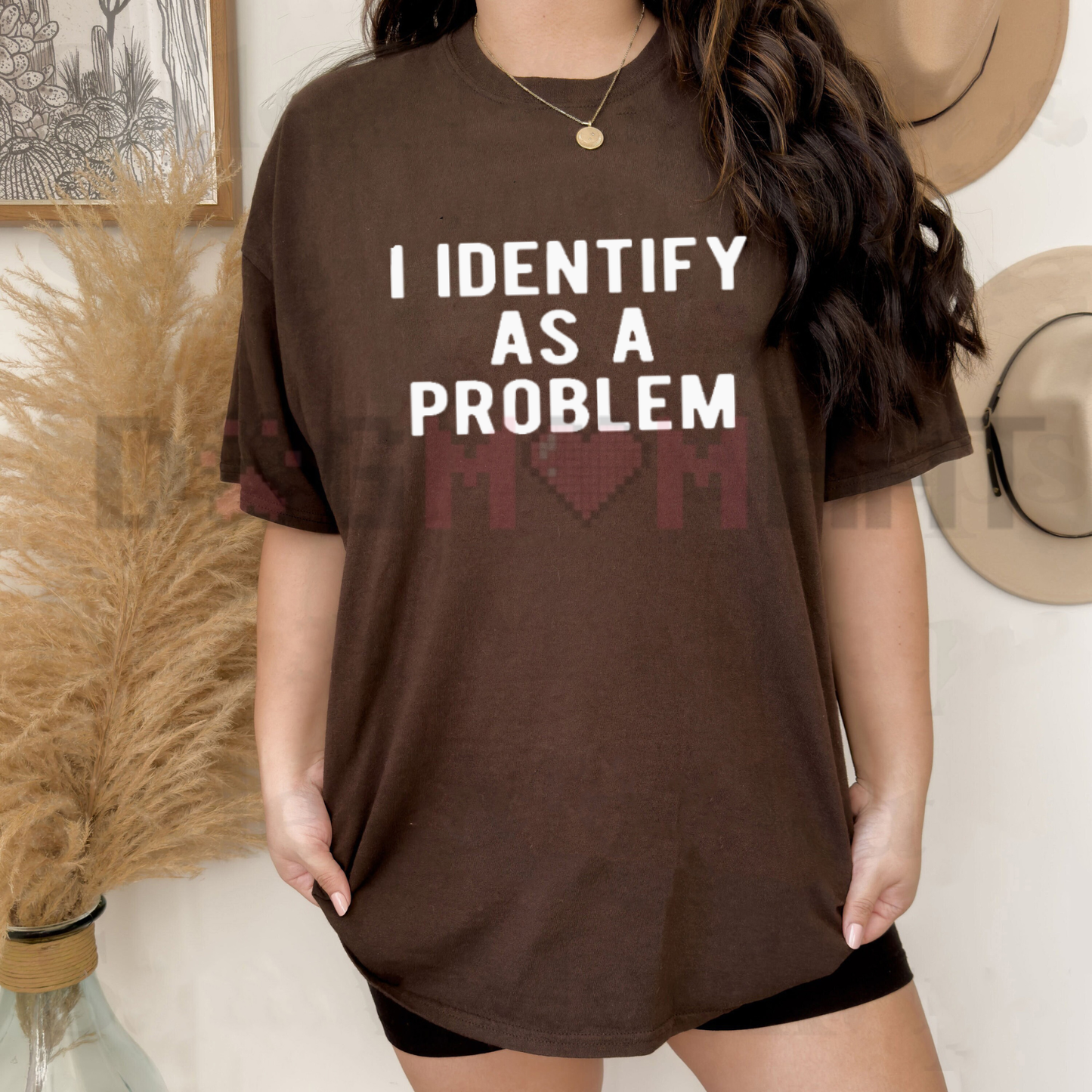 Front view of the black "I Identify As A Problem" Funny T-Shirt showing the bold minimalist typography design - dogmomhat