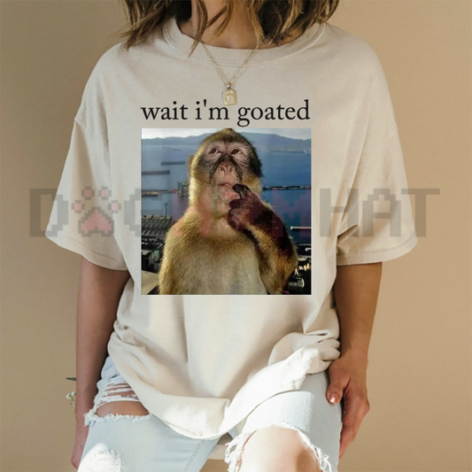 Front view of the black Wait I'm Goated Thinking Monkey Meme T-Shirt showing the detailed monkey graphic and text printed across the chest - dogmomhat
