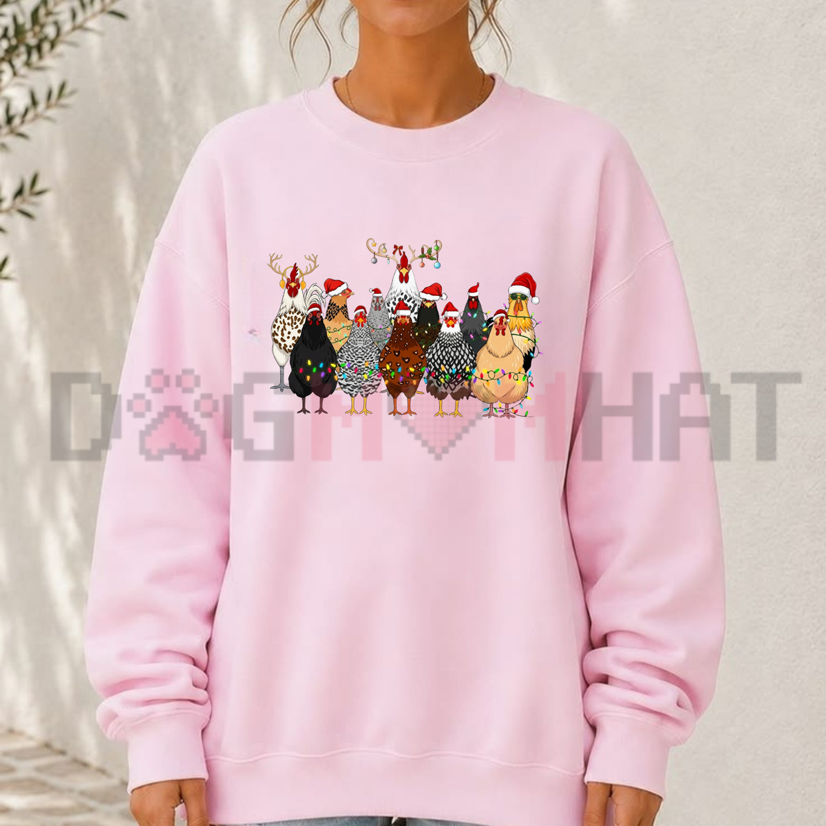 Front view of the cluckmas festive crewneck displaying cute Christmas chickens in Santa hats graphic artwork across the chest of a soft fleece sweatshirt. - dogmomhat