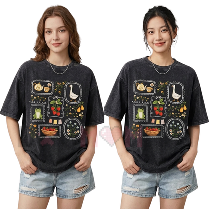 Front view of the dark charcoal Women's Vintage Acid Wash T-Shirt showing the detailed cloud-like mineral texture and relaxed loose fit silhouette - dogmomhat
