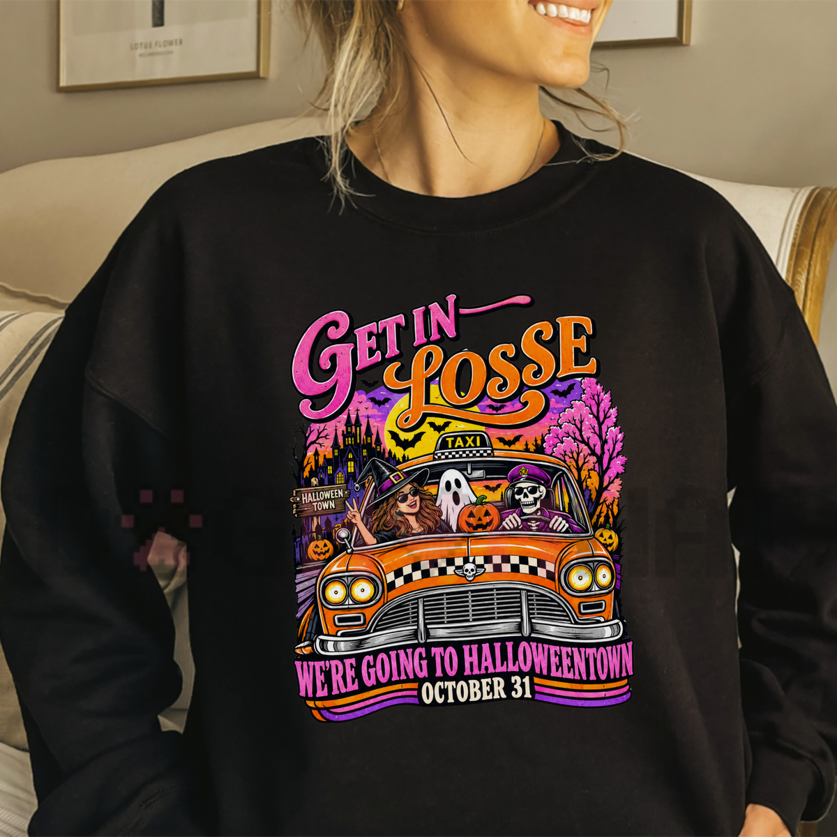 Front view of the festive friction crewneck displaying Going To Halloweentown graphic artwork across the chest of a soft fleece sweatshirt. - dogmomhat