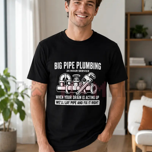 Front view of the navy blue Big Pipe Plumbing Graphic T-Shirt showing the detailed tradesman humor illustration printed across the chest - dogmomhat