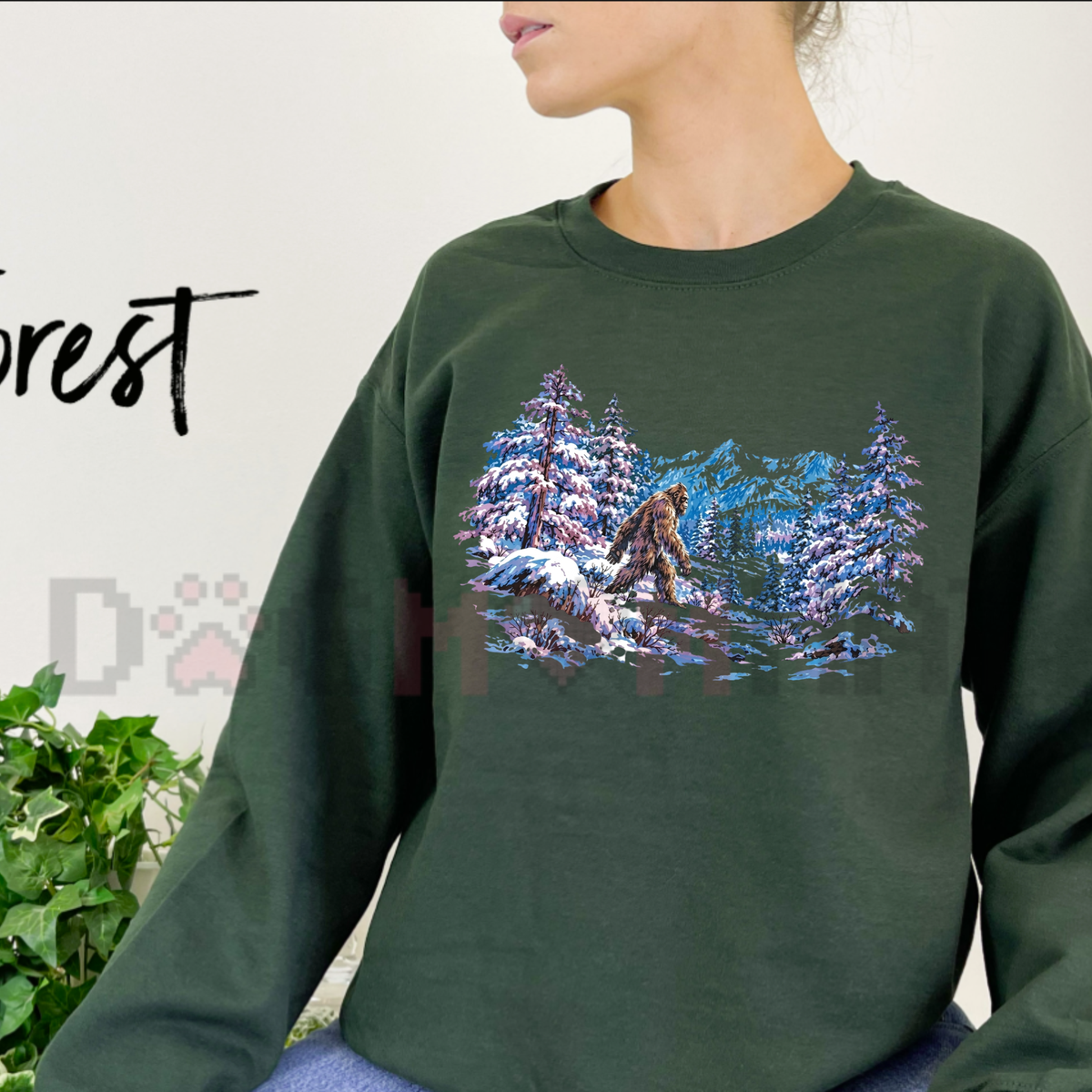 Front view of the parke horizon sweatshirt displaying vintage Sasquatch Bigfoot snowy forest graphic artwork across the chest of a soft fleece crewneck pullover. - dogmomhat