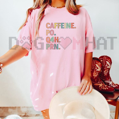 Front view of the parke horizon tee displaying funny 'Caffeine PO Q4H PRN' medical prescription quote graphic artwork across the chest of a soft crewneck shirt. - dogmomhat