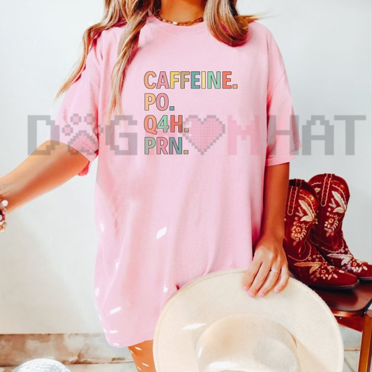 Front view of the parke horizon tee displaying funny 'Caffeine PO Q4H PRN' medical prescription quote graphic artwork across the chest of a soft crewneck shirt. - dogmomhat