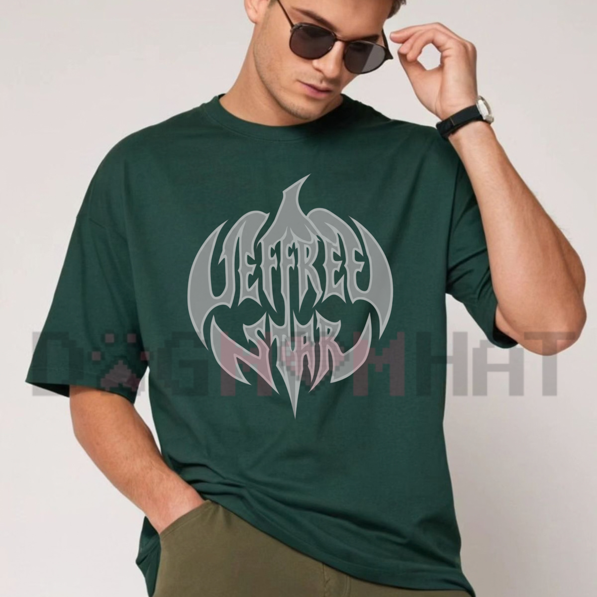 Front view of the spooky star harvest tee displaying pumpkin logo graphic artwork across the chest of a dark cotton shirt. - dogmomhat