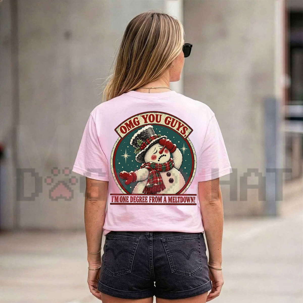 Front view of the sub-zero stress point tee displaying a melting snowman with sarcastic holiday quote graphics across the chest of a cotton shirt. - dogmomhat