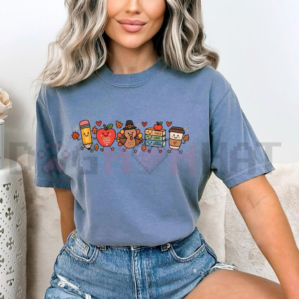 Front view of the t-shirt displaying cute autumn doodle 'Thankful Teacher' turkey graphic typography across the chest of a soft garment-dyed crewneck shirt. - dogmomhat