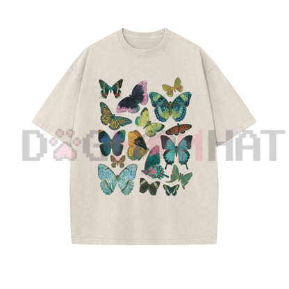 Front view of the washed black FLUTTER Vintage Wash Graphic T-Shirt showing the detailed butterfly art printed across the chest - dogmomhat
