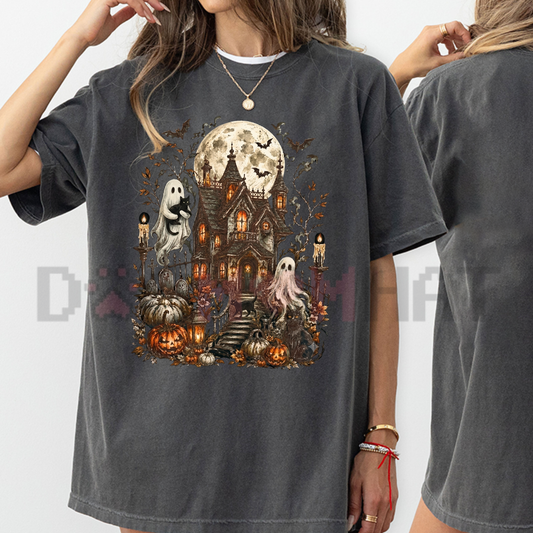 Front view of the washed pepper gray Comfort Colors Haunted House Ghost T-Shirt showing the detailed gothic spooky cottage print across the chest - dogmomhat