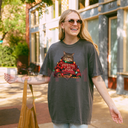 Front view of the wild coven tee displaying vintage smoking grumpy cat ugly Christmas sweater graphic artwork across the chest of a garment-dyed shirt. - dogmomhat