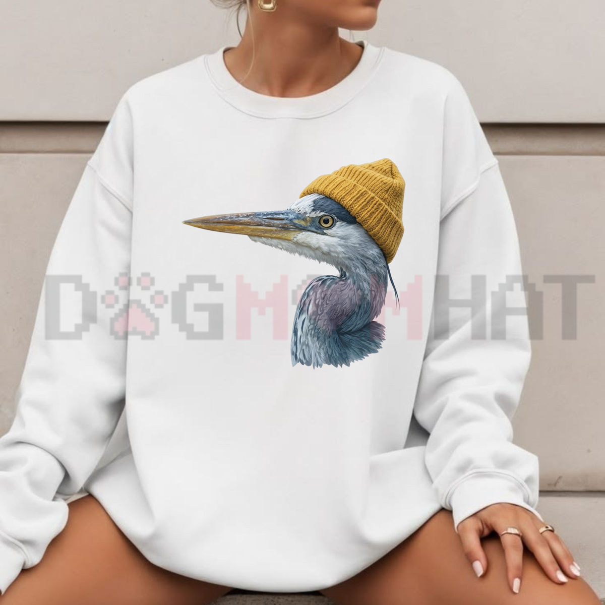 Shop this festive friction sweatshirt. Plush fleece crewneck pullover featuring retro 90s Great Blue Heron wearing a beanie birdwatching graphic artwork. Printed in USA! - dogmomhat
